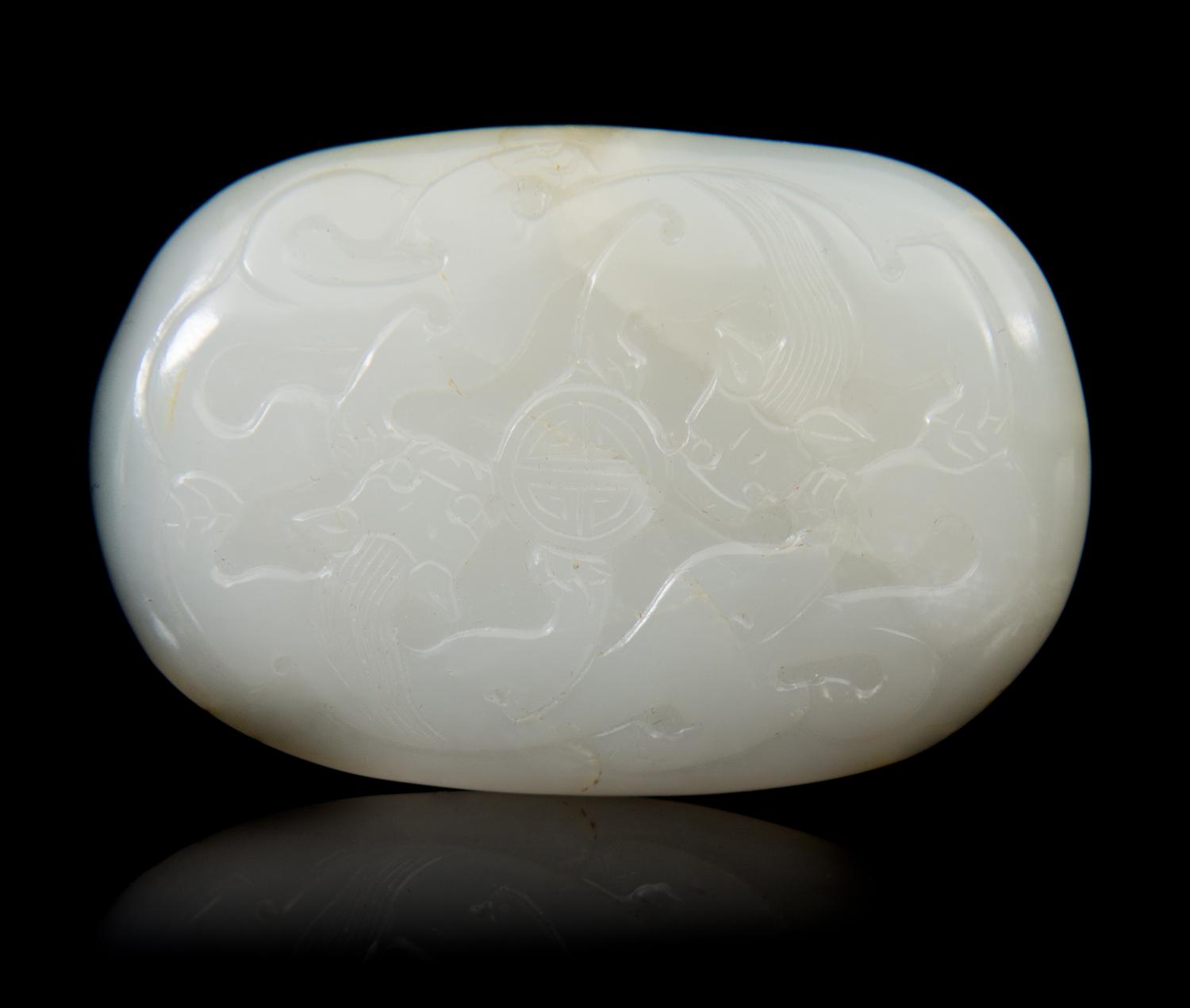 A Carved Jade Belt Hook Length 2 5/8 inches.