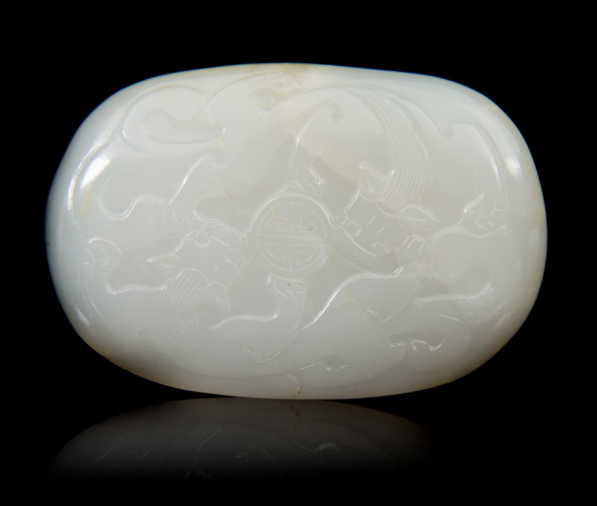 A Carved Jade Belt Hook Length 2 5/8 inches.