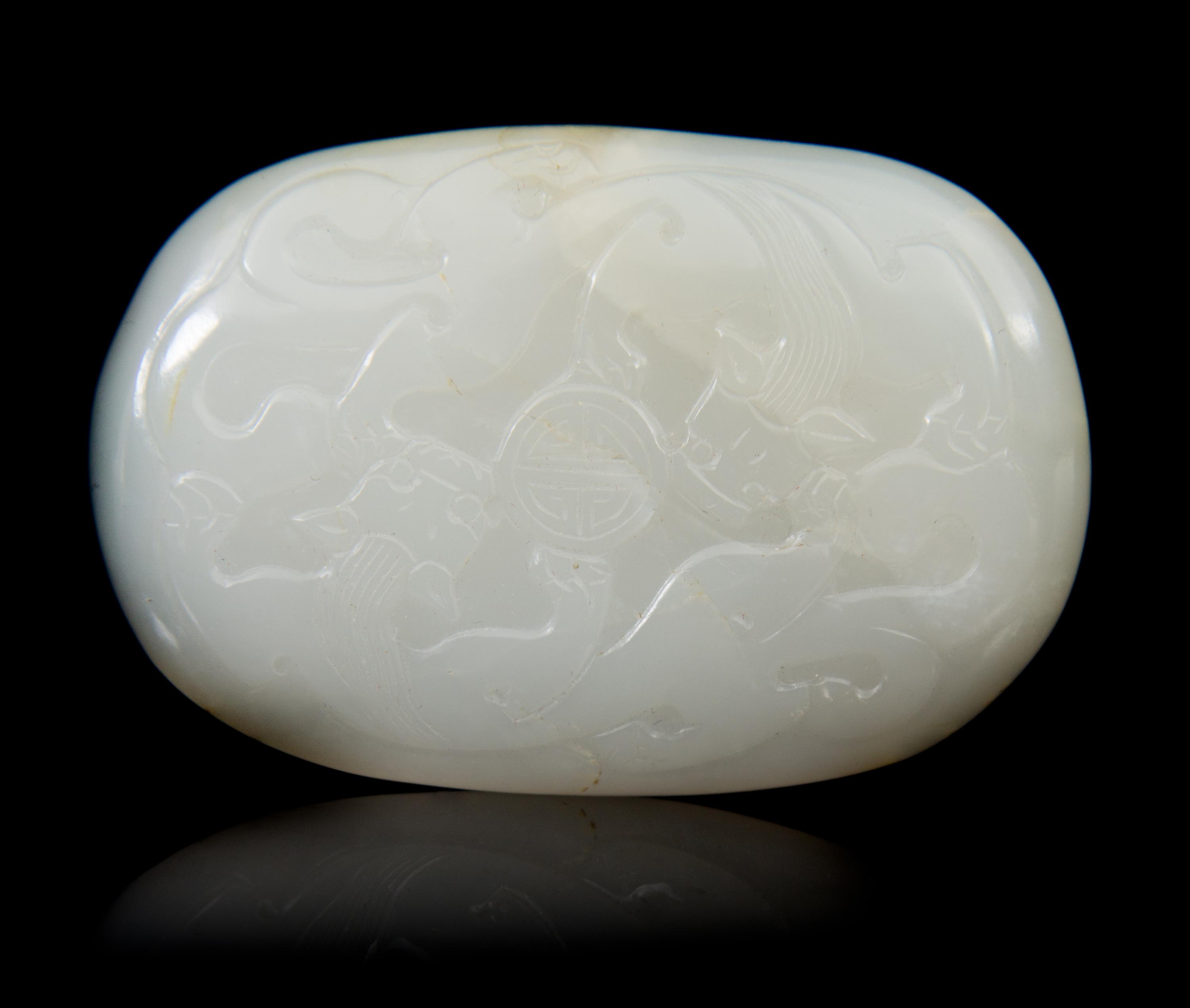 A Carved Jade Belt Hook Length 2 5/8 inches.