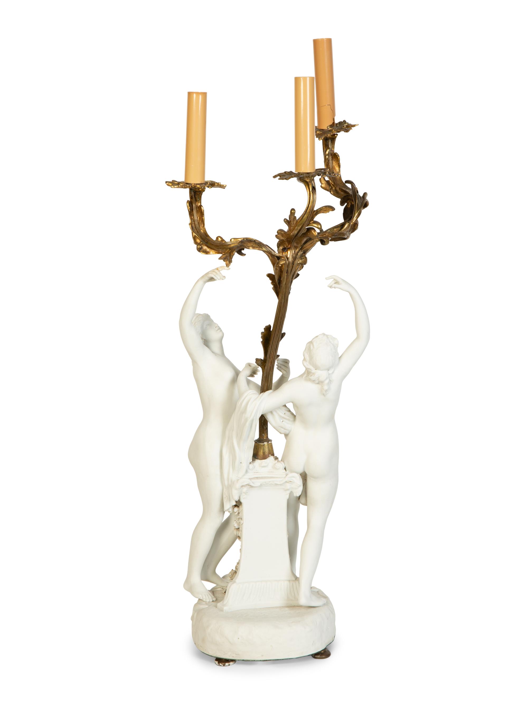 A Pair of Venetian Painted and Parcel Gilt Columns with Putti