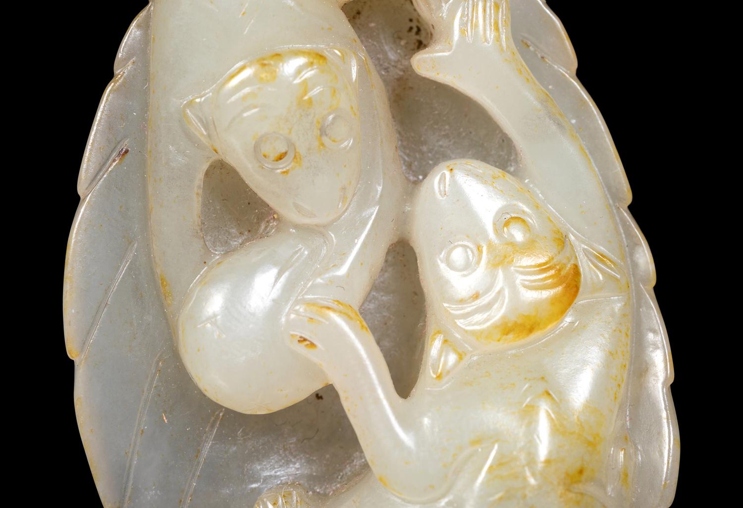 Three Chinese Celadon Jade Carvings of Monkeys