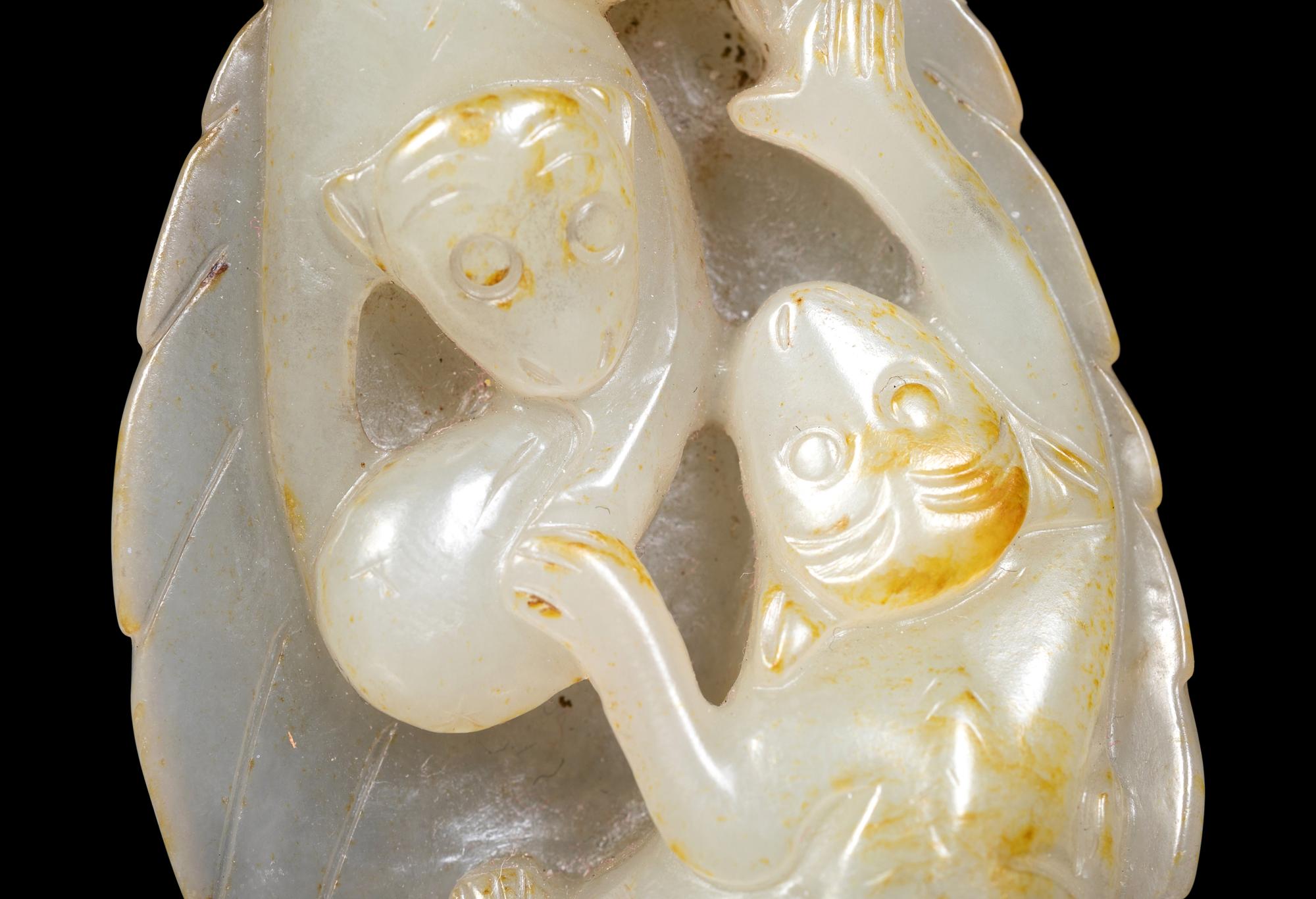 Three Chinese Celadon Jade Carvings of Monkeys