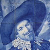 A Delft Tile Mosaic After Frans Hals 70.5" W x 4" D x 64.5" H — Netherlands, 19th Century