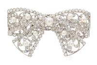 An Edwardian Platinum, Diamond and Pearl Bow Brooch, 23.00 dwts.