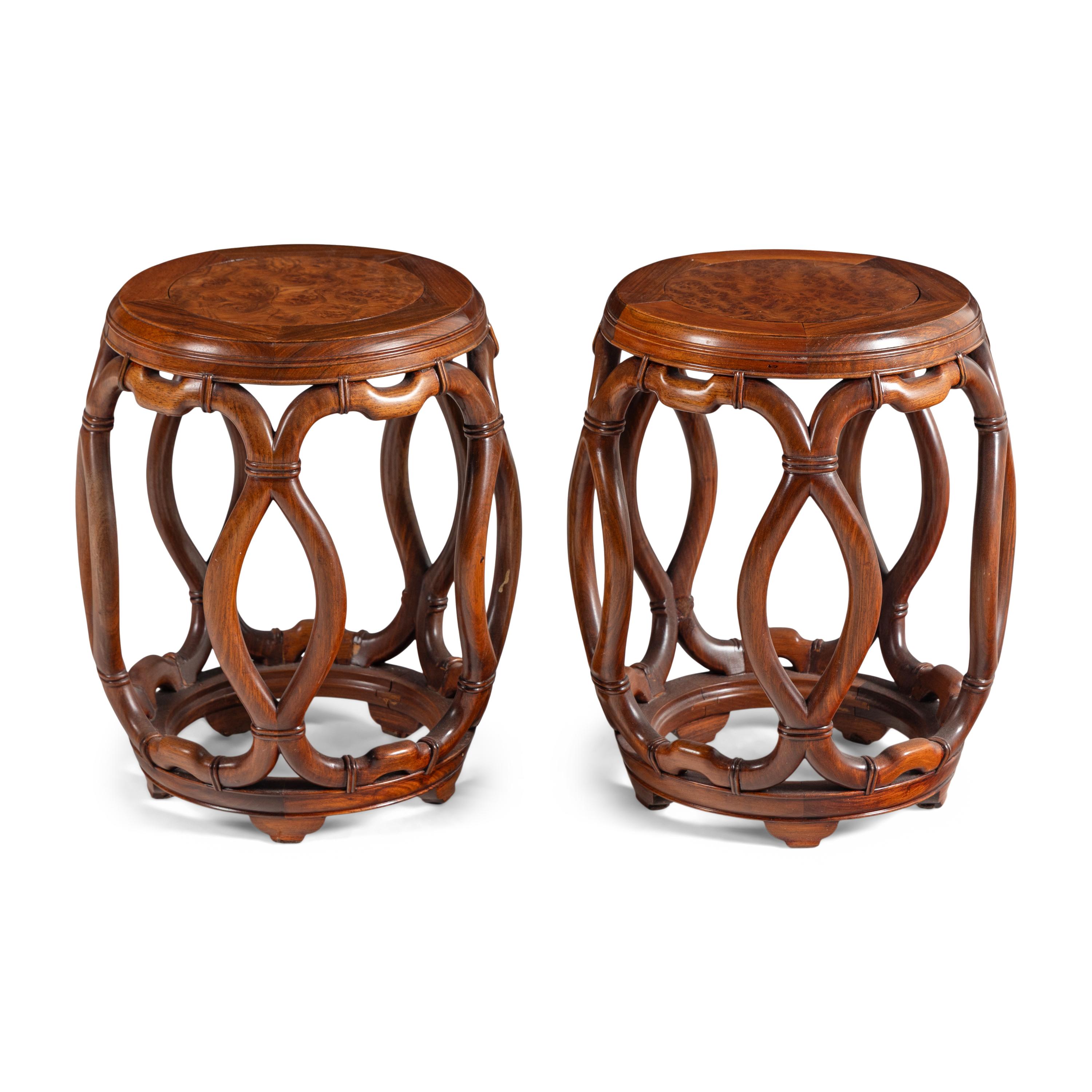 A Pair of Chinese Burlwood Top Hardwood Garden Stools and a Famille Rose Porcelain Garden Stool, Gudeng, 20th Century 近代 鼓凳一組三件