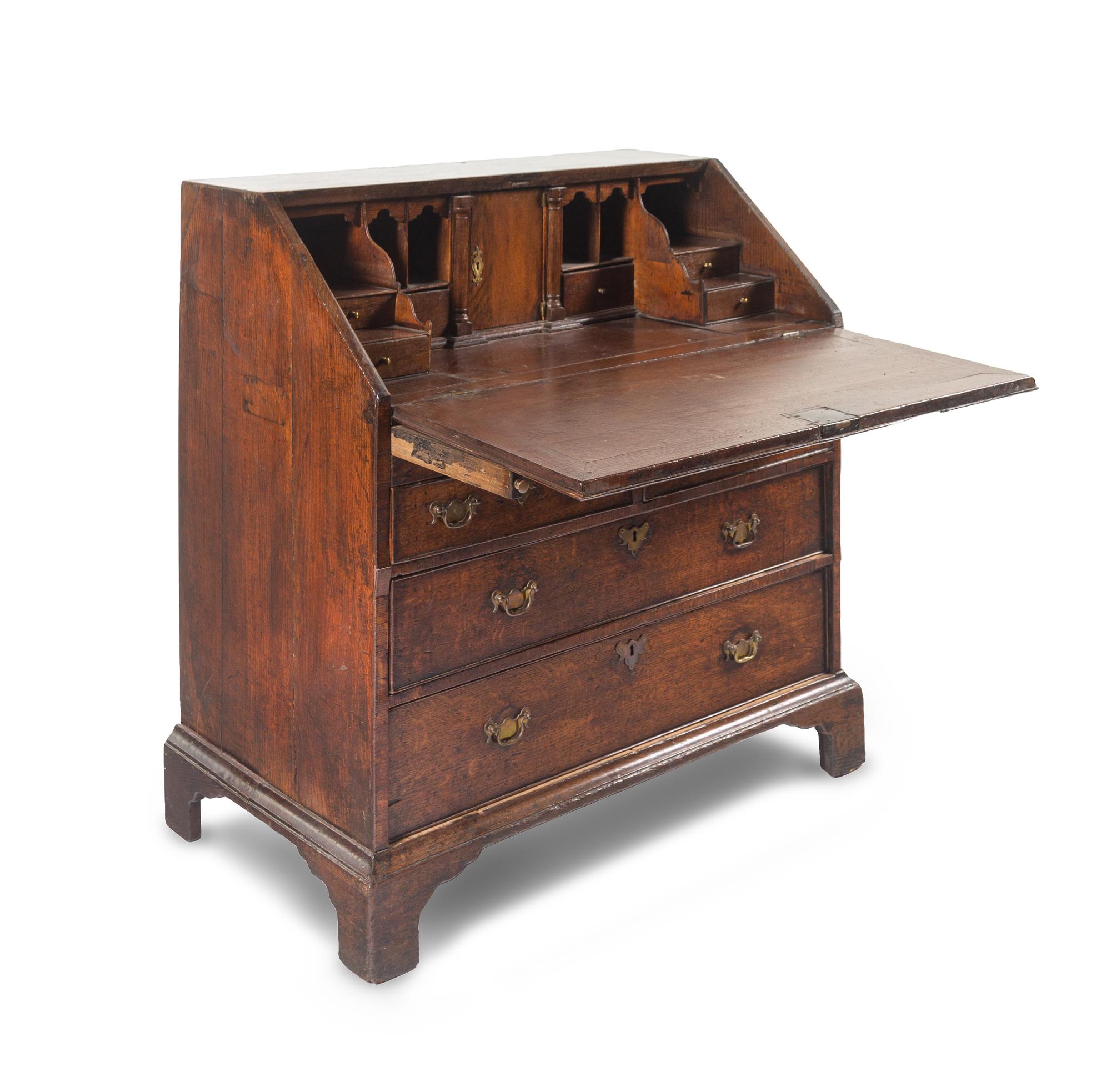 A George III Provincial Oak Slant-Front Secretary Desk