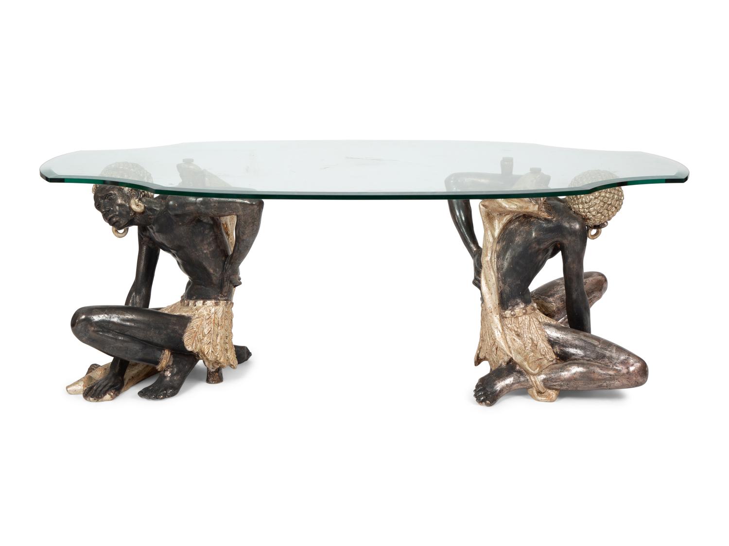 A Figural Moor Style Polychromed and Glass Top Table — 20TH CENTURY