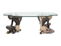 A Figural Moor Style Polychromed and Glass Top Table — 20TH CENTURY