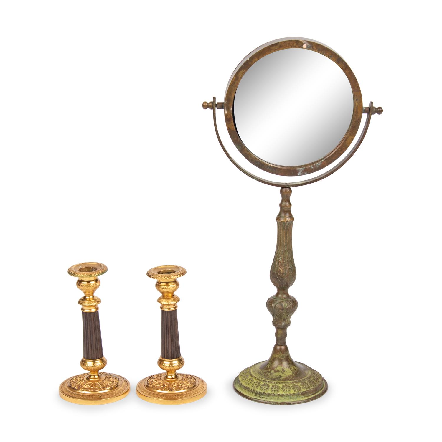 A Pair of Gilt Metal Mounted Candlesticks