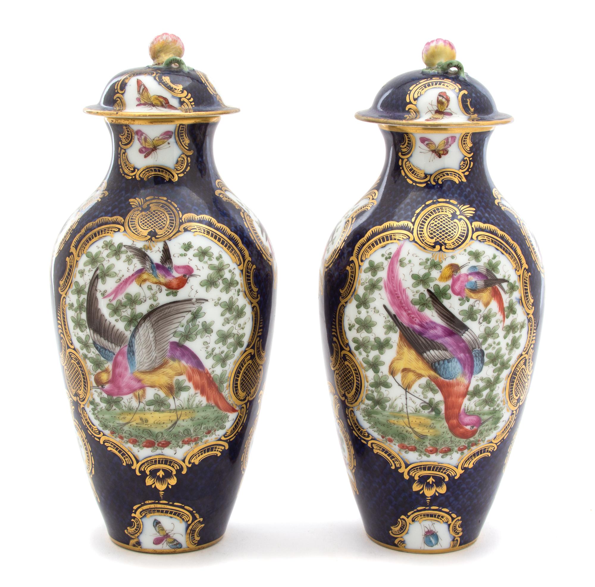 A Pair of English Chelsea Polychomed Porcelain Lidded Urns Height 10 1/2 x diameter 4 1/2 inches. — LATE 18TH/EARLY 19TH CENTURY