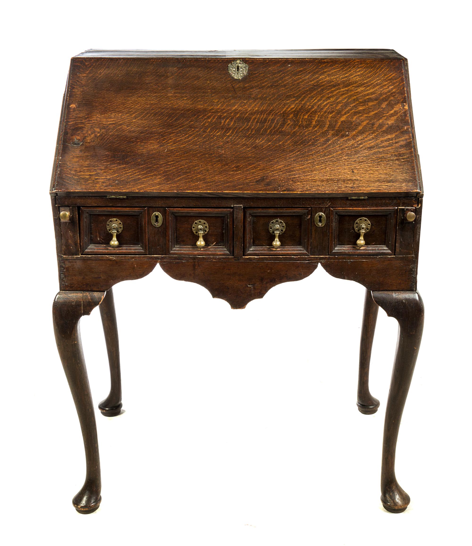 An English Oak Slant Front Writing Desk Height 39 1/2 x width 30 1/4 x depth 20 1/2 inches. — 18TH/19TH CENTURY