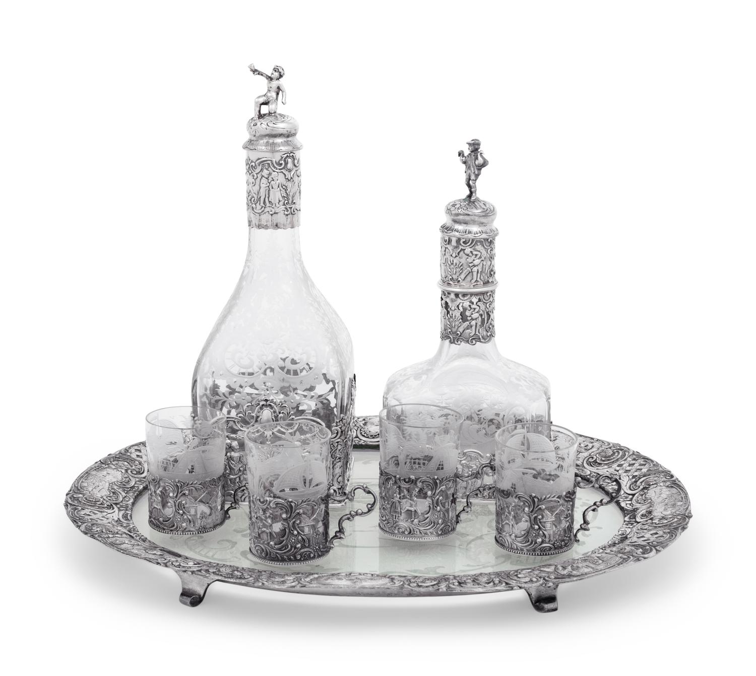 A Continental Silver Mounted Etched Glass Drink Service