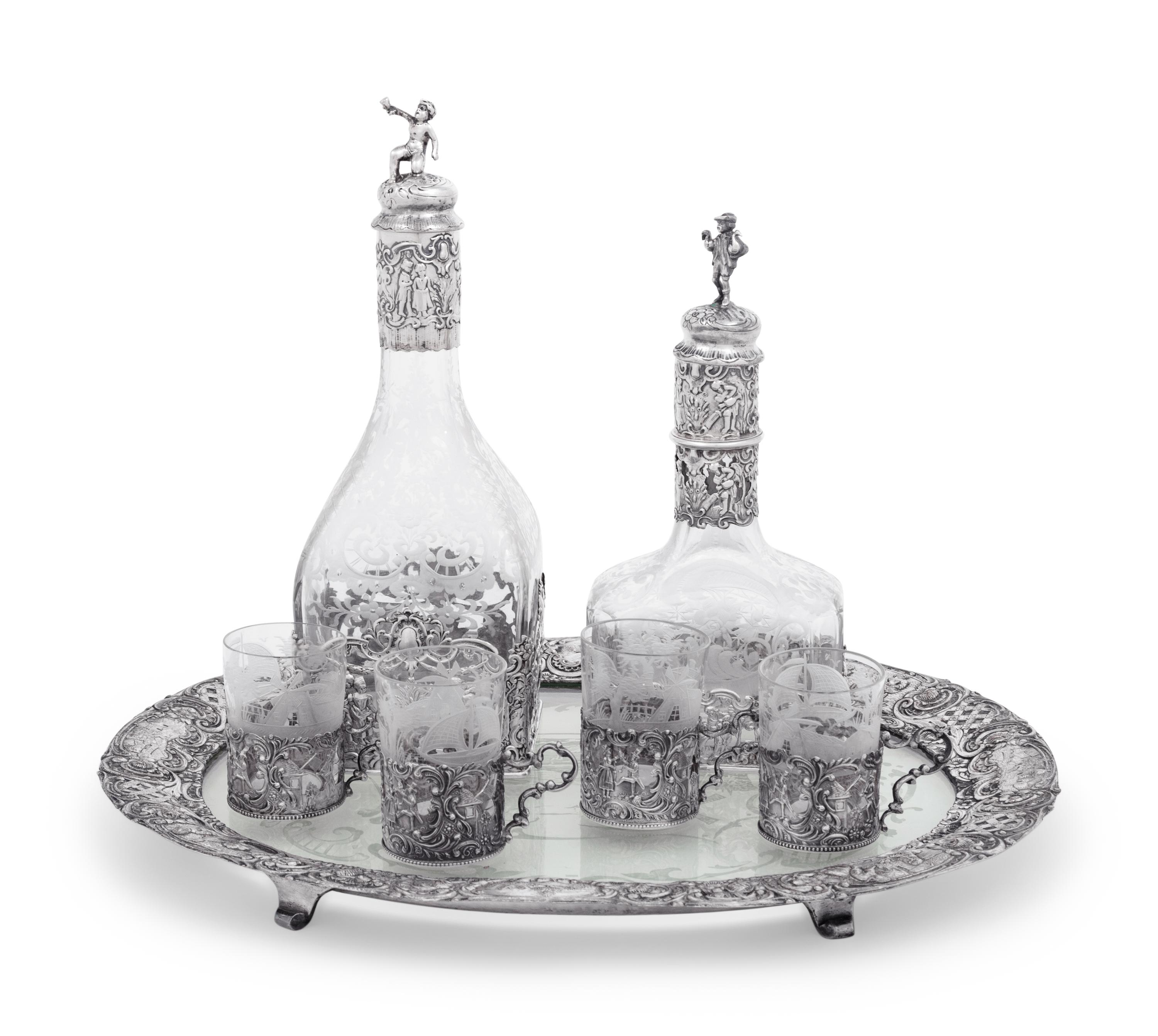 A Continental Silver Mounted Etched Glass Drink Service