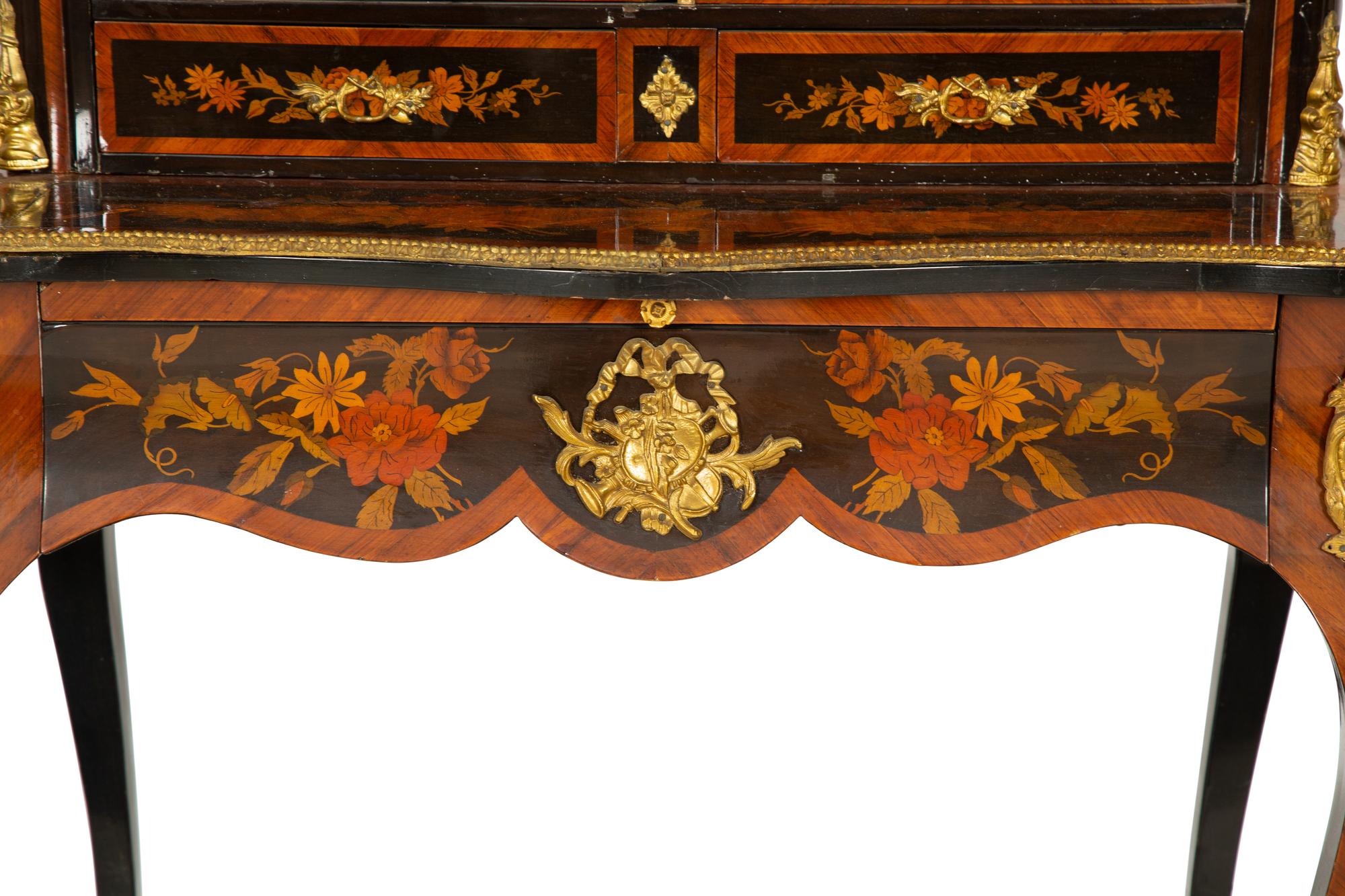 A Louis XV Style Gilt Bronze Mounted Marquetry Bonheur du Jour