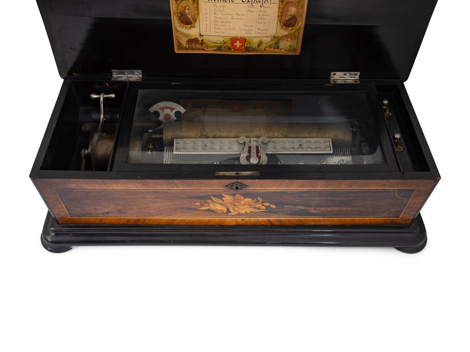 A Swiss Cylinder Music Box in a Rosewood and Marquetry Case