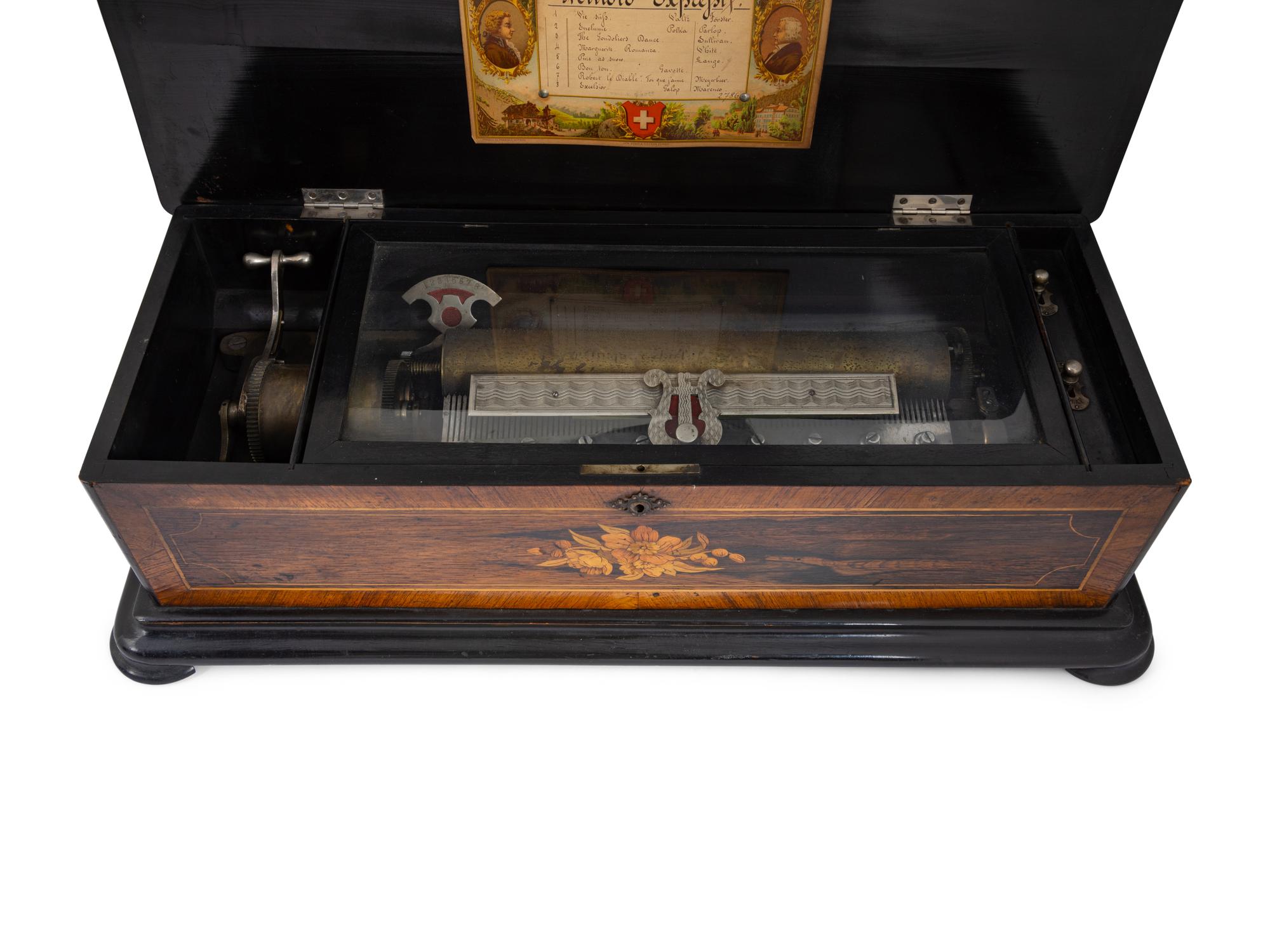A Swiss Cylinder Music Box in a Rosewood and Marquetry Case