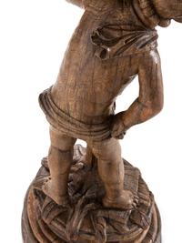 A Continental Carved Oak Figural Pedestal