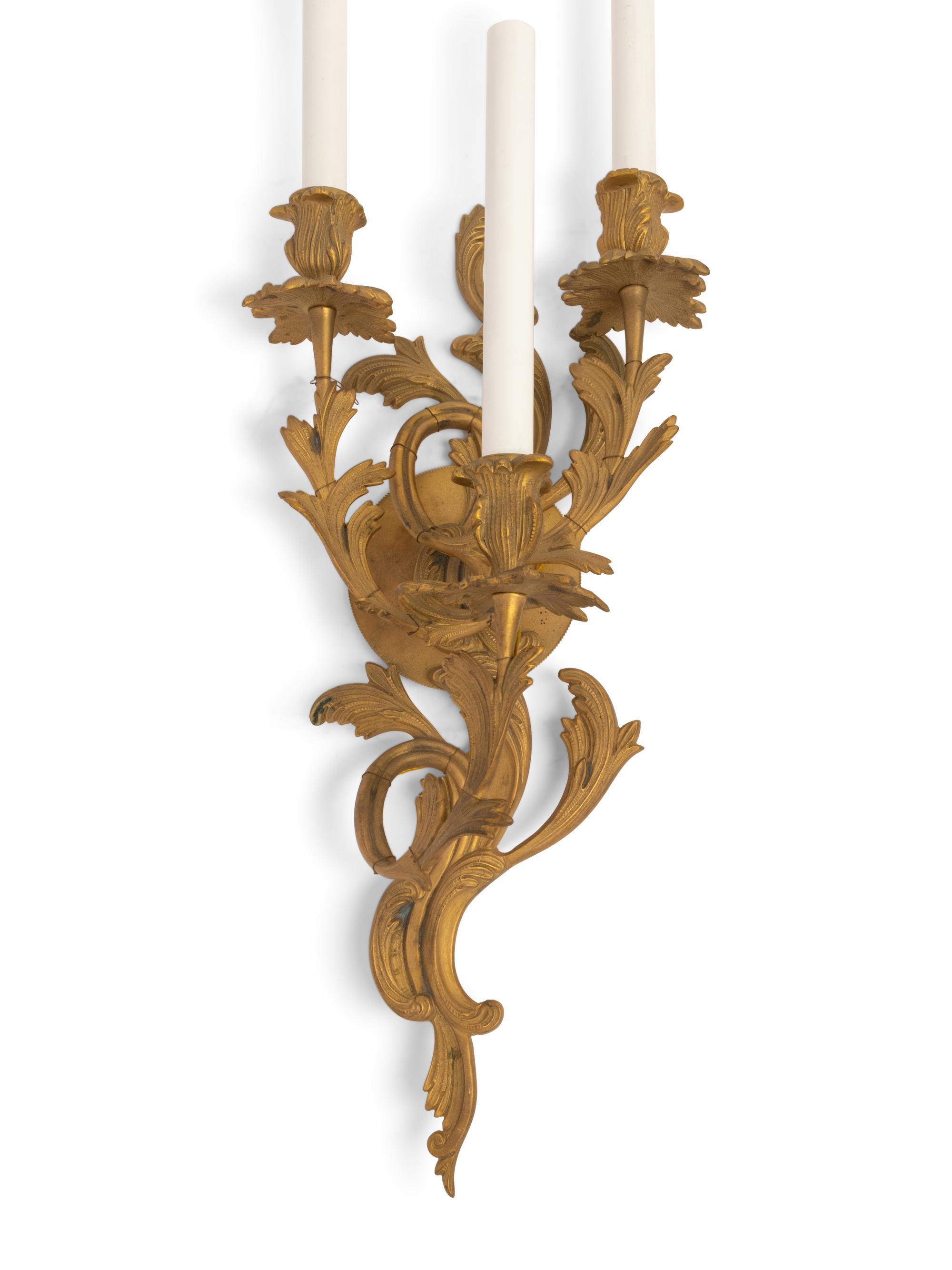 A Pair of Louis XV Style Gilt Bronze Three-Light Sconces