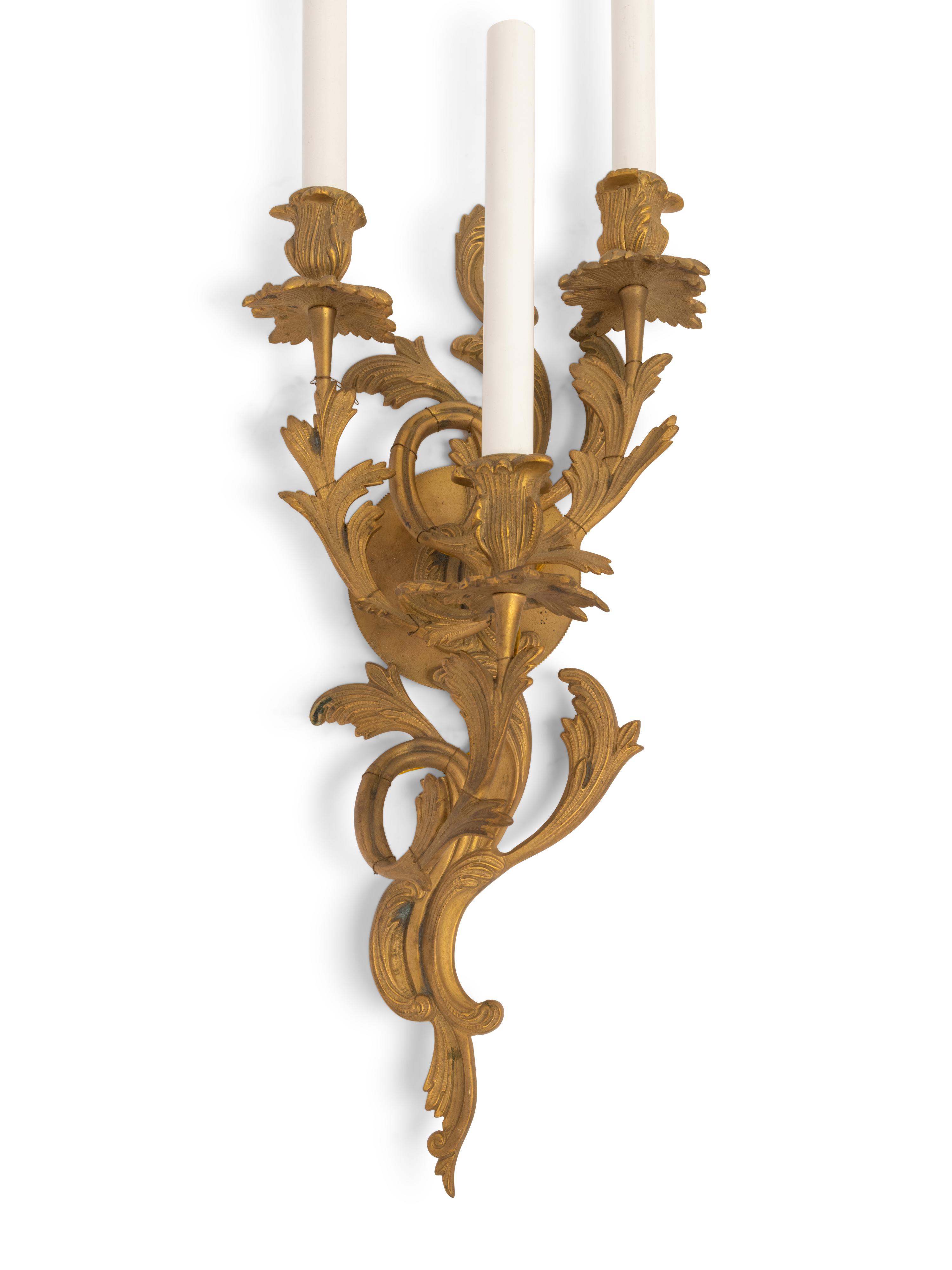 A Pair of Louis XV Style Gilt Bronze Three-Light Sconces