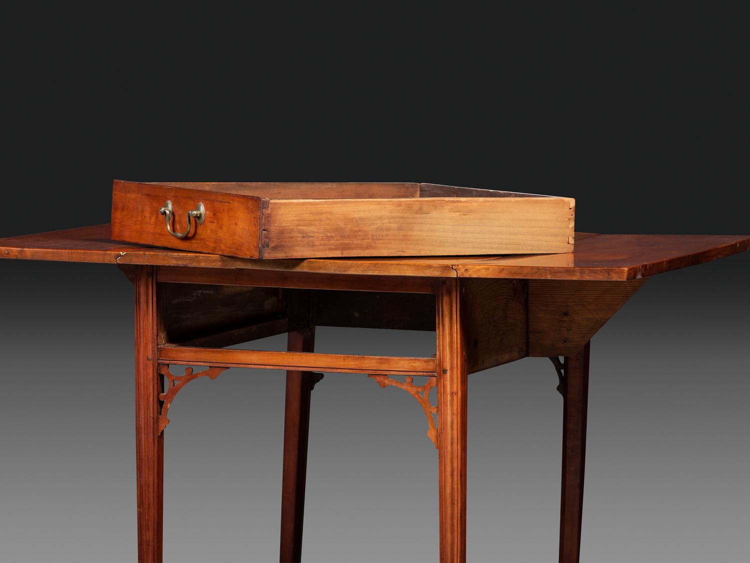 A Late Chippendale Carved Cherrywood Stretcher-Base Pembroke Table