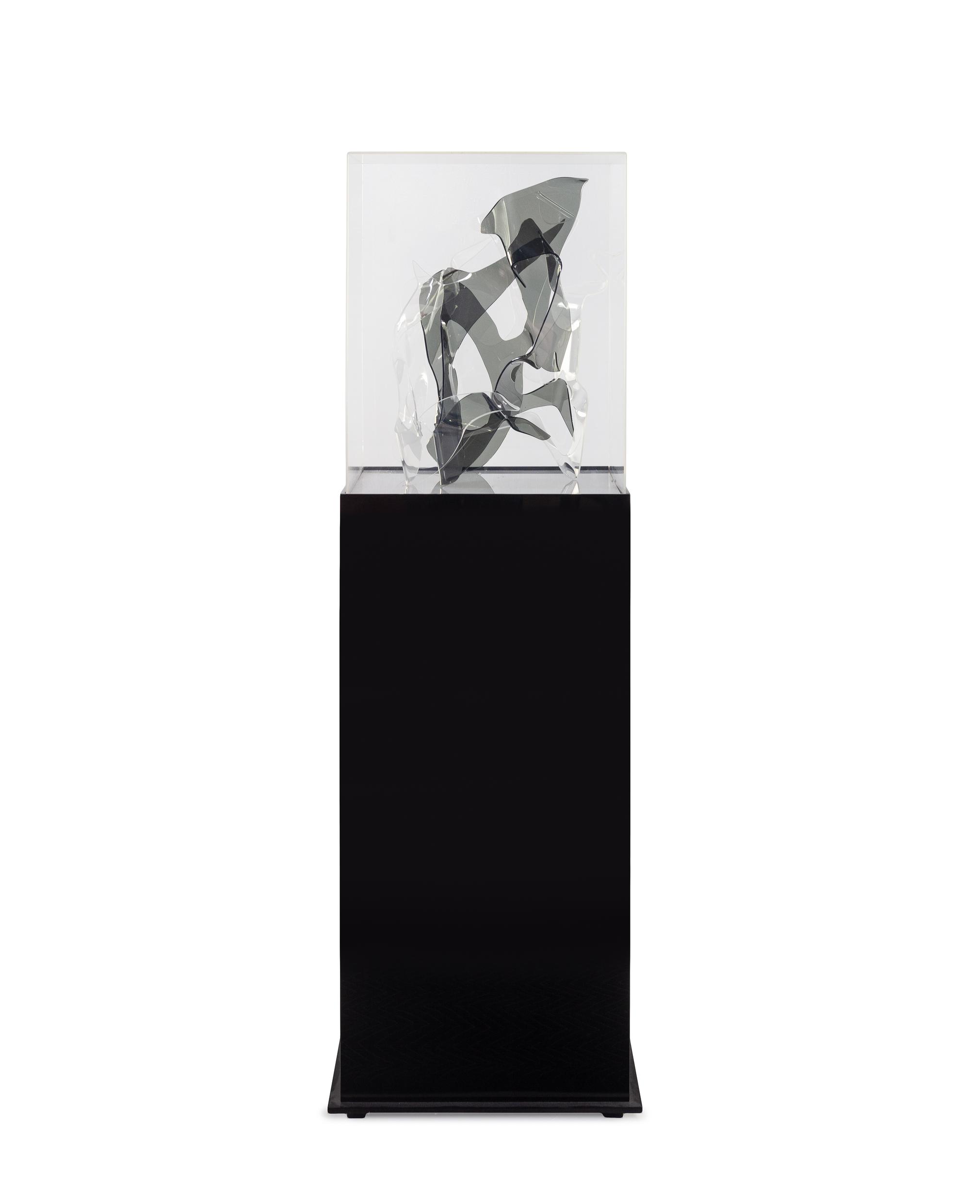 Sculpture and Lighted Pedestal