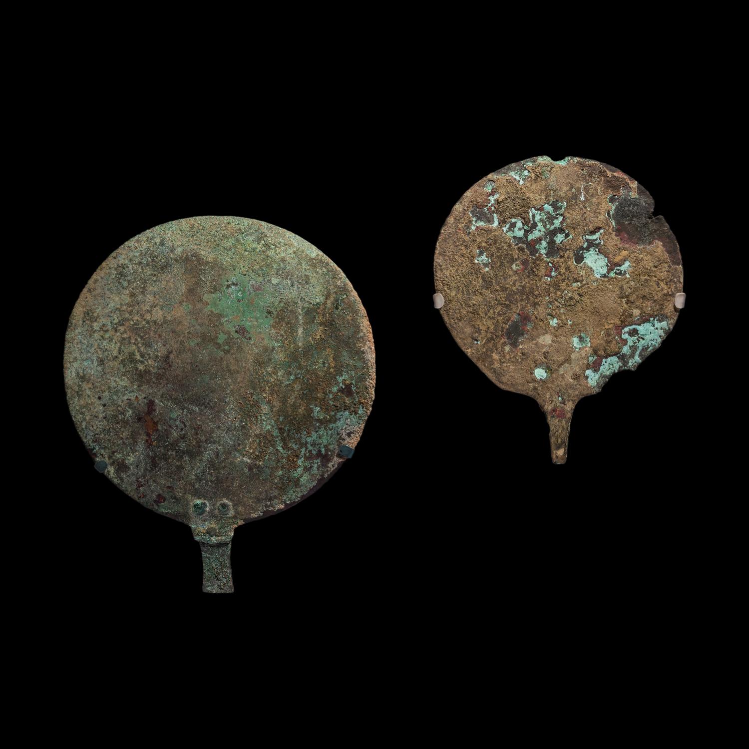 Two Roman Bronze Hand Mirrors