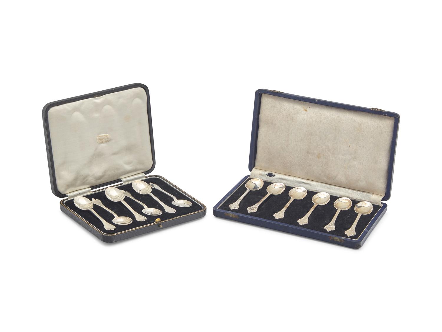 Two Cased Sets of Six George V Britannia Silver Trefid Teaspoons