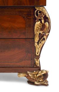 An Italian Parcel-Gilt Mahogany Chest of Drawers