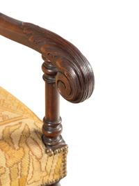 A William and Mary Style Carved Walnut Armchair