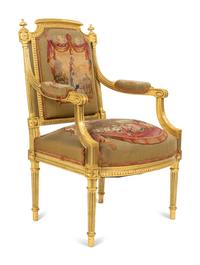 A Set of Four Louis XVI Style Giltwood Fauteuils with Tapestry Upholstery — 19TH CENTURY