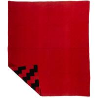 A Red and Black Pieced Zig Zag Pattern Quilt
