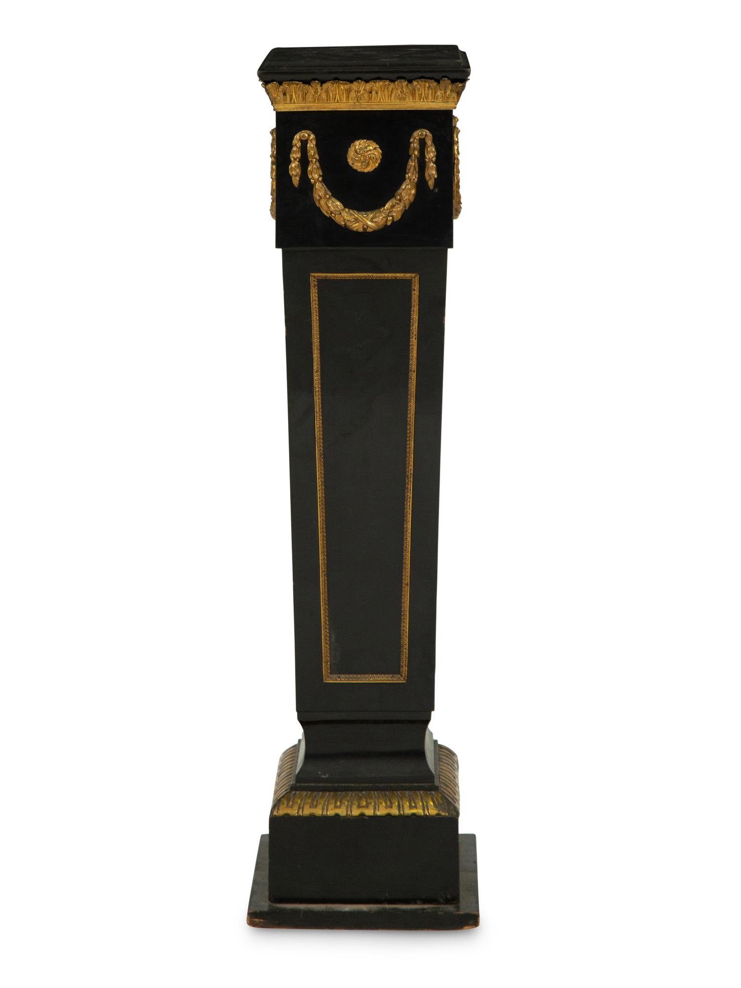 A Napoleon III Style Gilt Bronze Mounted Ebonized Pedestal