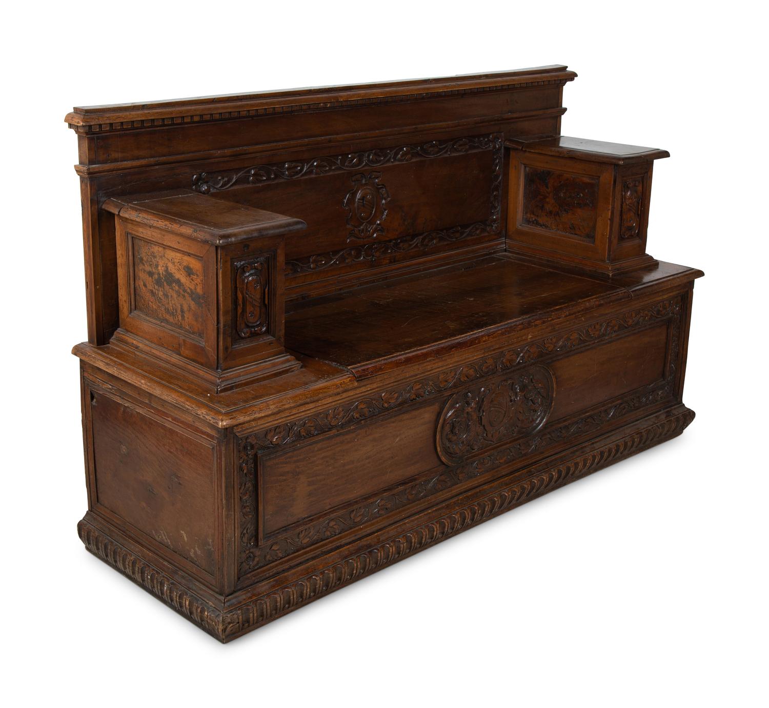 An Italian Carved Walnut Cassapanca — 17/18TH CENTURY AND LATER