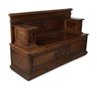 An Italian Carved Walnut Cassapanca — 17/18TH CENTURY AND LATER
