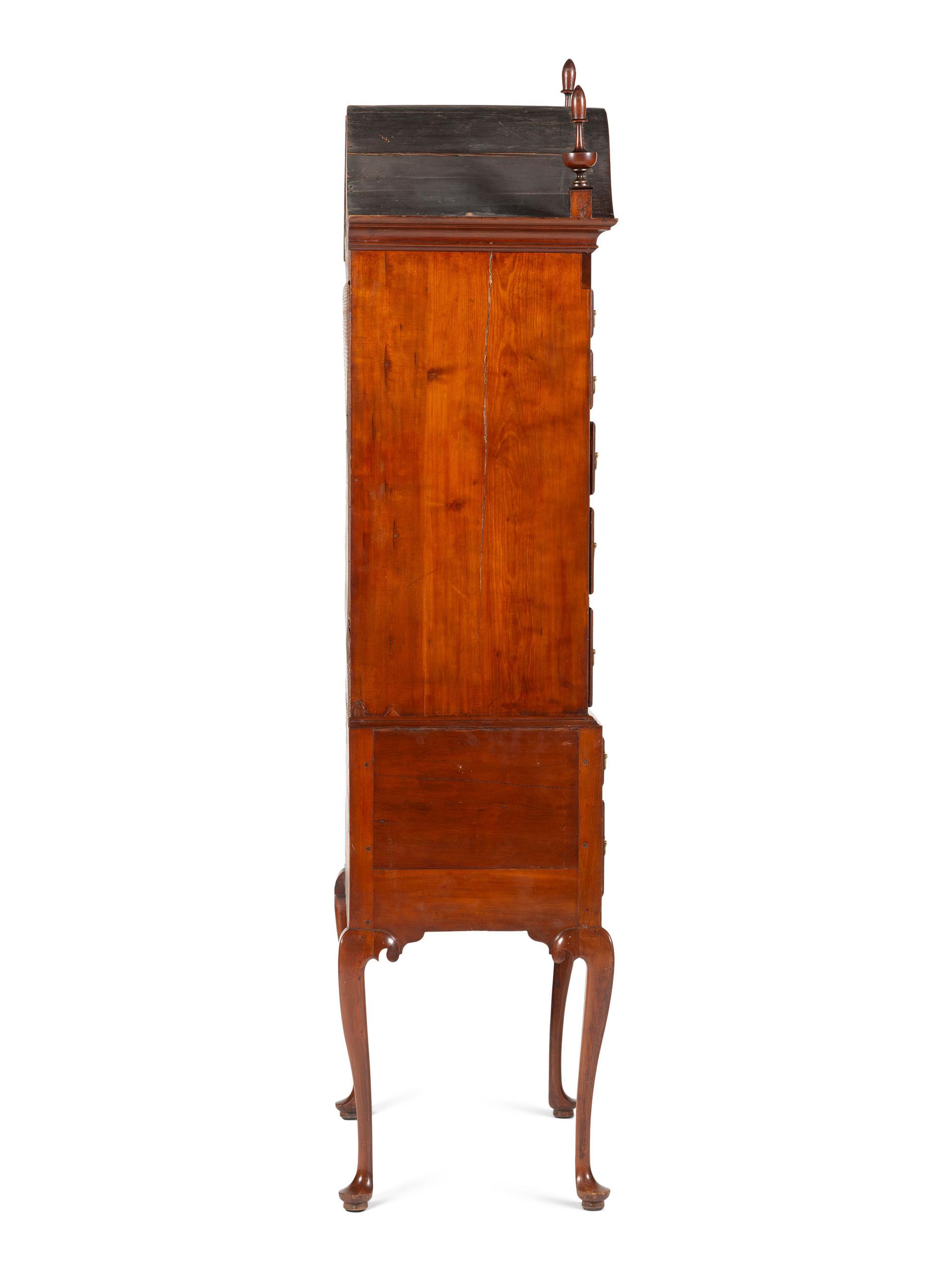 A Queen Anne Fan-Carved Cherrywood Bonnet-Top High Chest