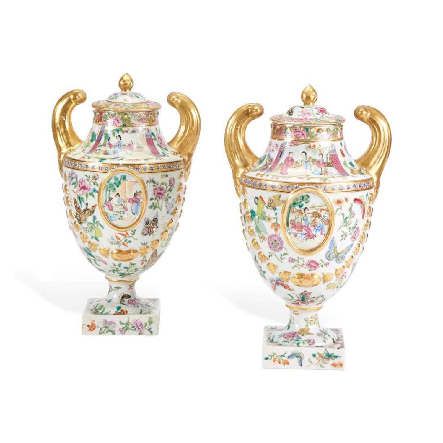 A Pair of Chinese Export Porcelain Famille Rose Pistol-Handled Urns and Covers early 19th century