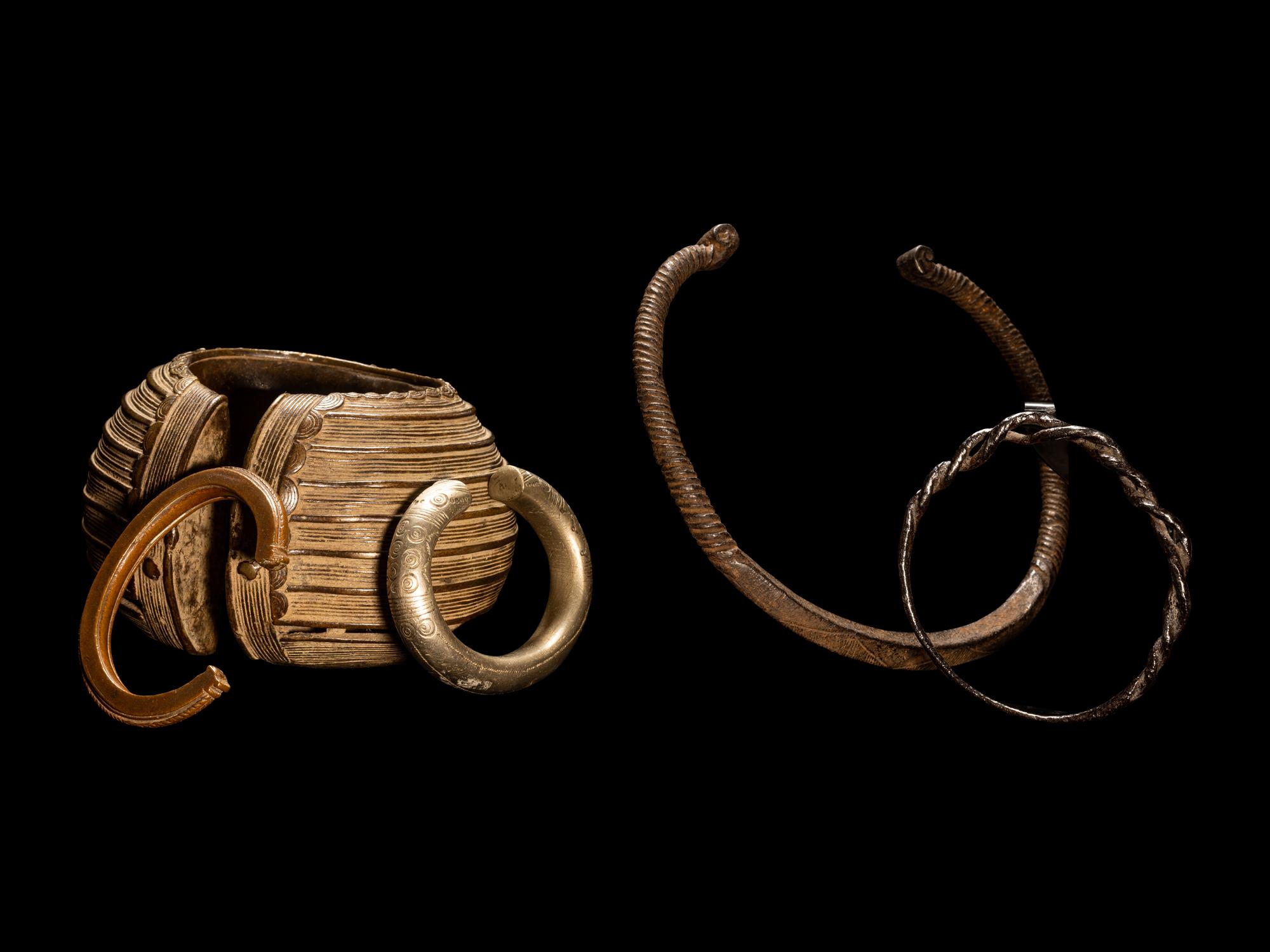 Five African Metalwork Currency Bracelets