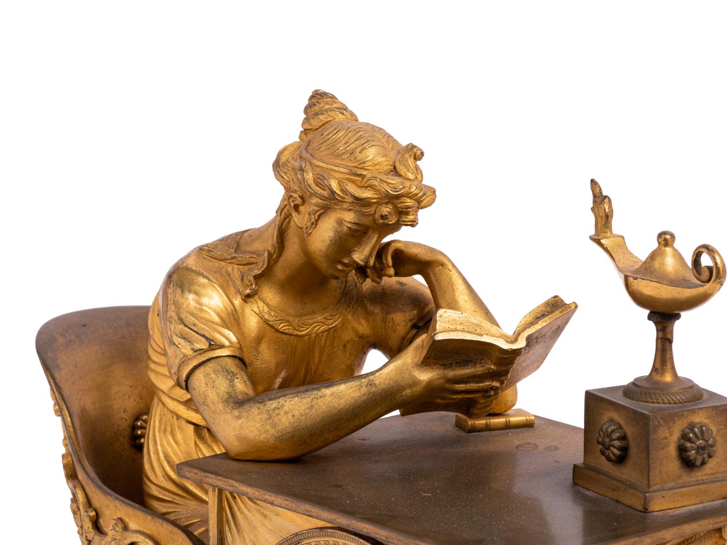 An Empire Gilt Bronze and Marble Figural Mantel Clock