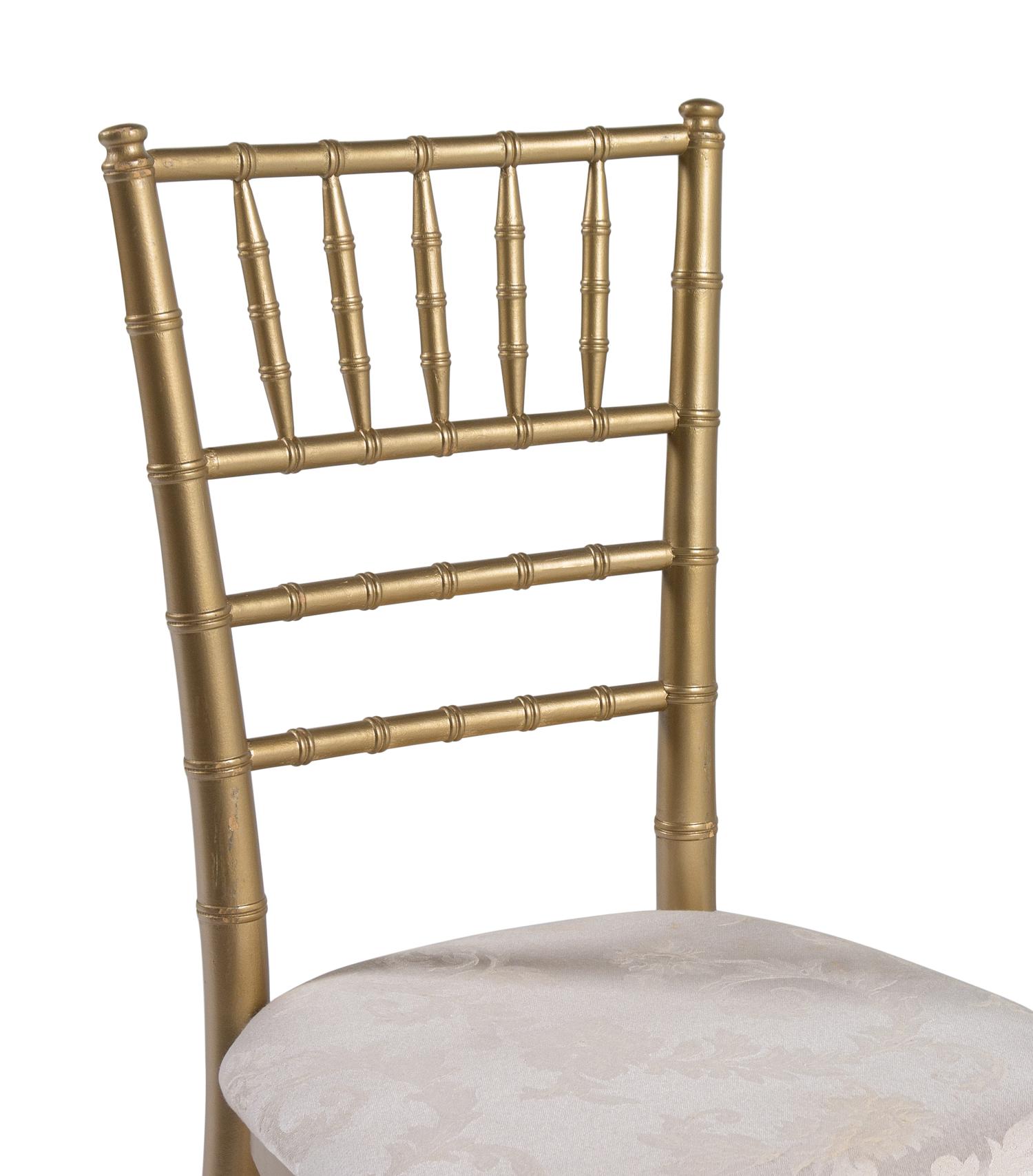 A Set of Thirteen Gold-Painted Ballroom Chairs