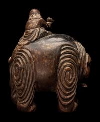 A Chinese Carved Wood 'Foreigner and Elephant' Figural Group