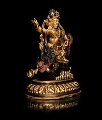 A Sino-Tibetan Gilt Bronze Figure of Kubera