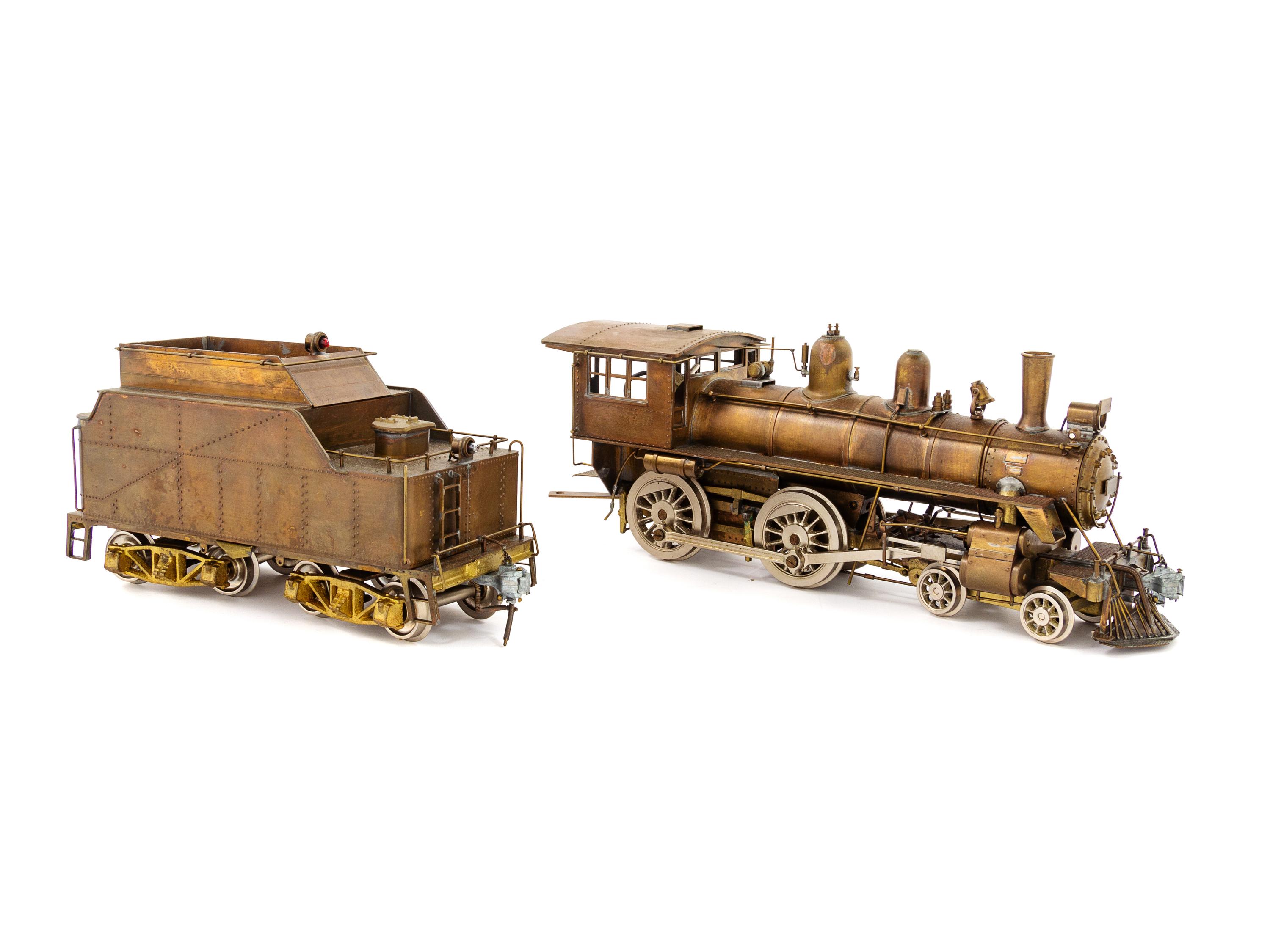 A Japanese Brass O-Gauge 4-4-0 Locomotive and Tender