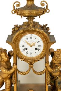 A Napoleon III Gilt Bronze Mantel Clock by Victor Paillard