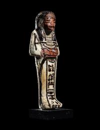 An Egyptian White Faience Ushabti for the Scribe Iuwy
