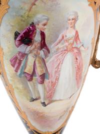 A Pair of Gilt Bronze Mounted Sèvres Style Porcelain, Onyx and Champlevé Urns