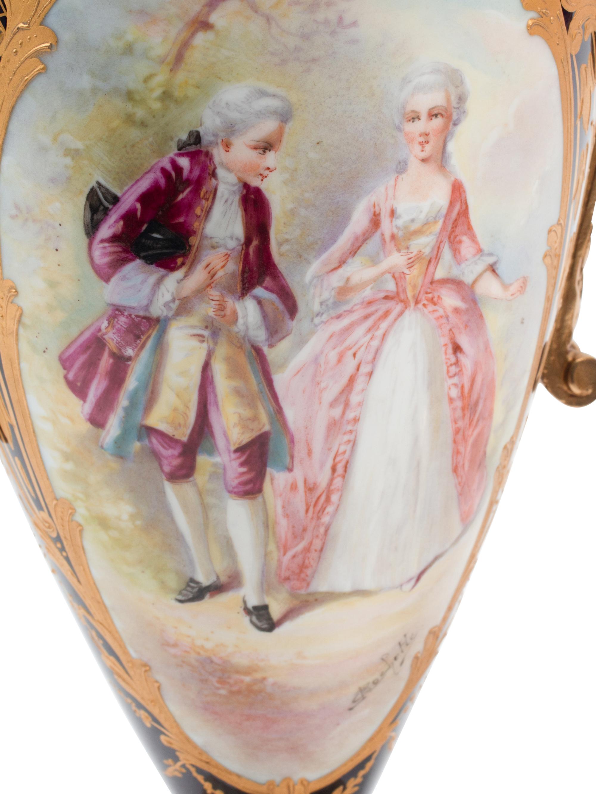 A Pair of Gilt Bronze Mounted Sèvres Style Porcelain, Onyx and Champlevé Urns