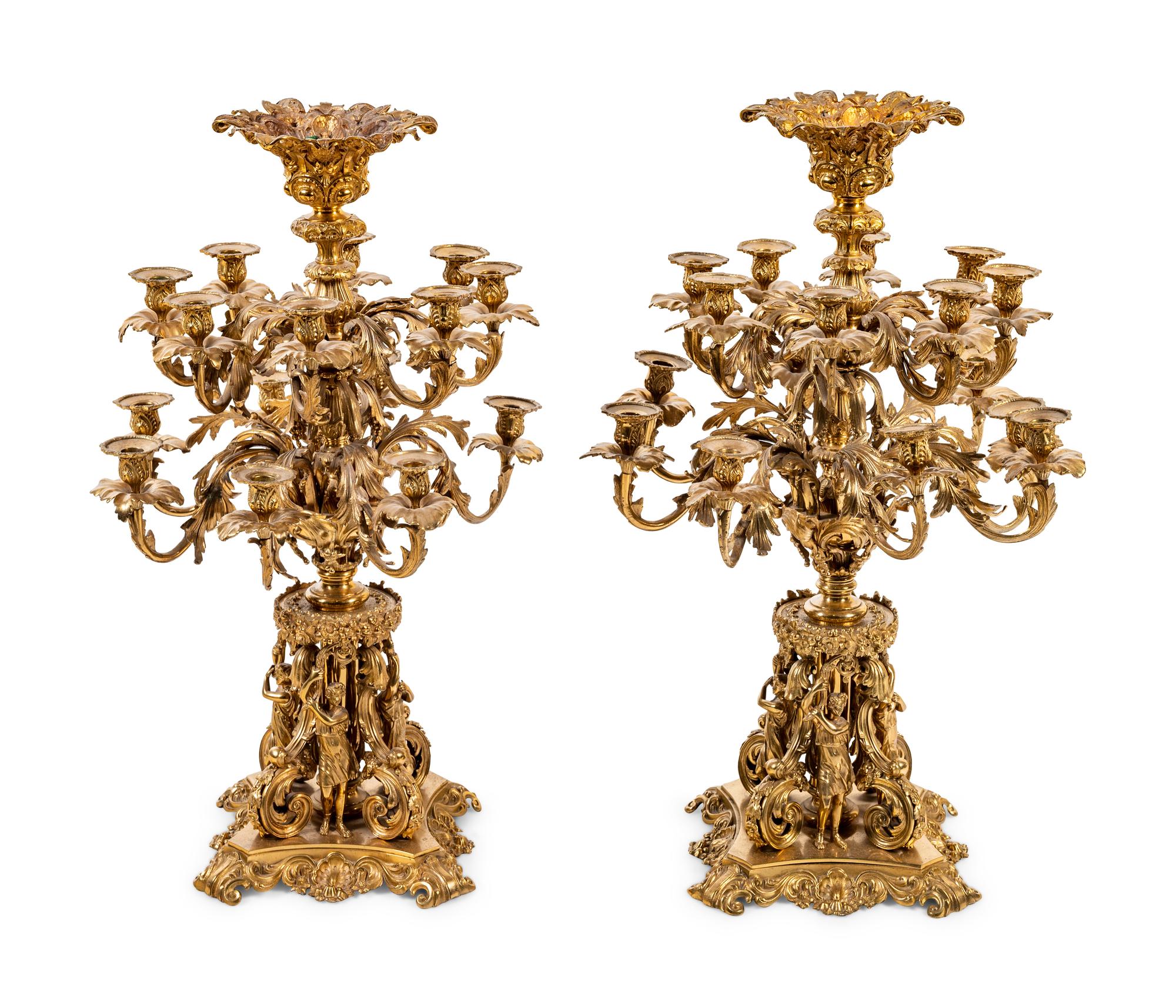 A Pair of Continental Gilt Metal Sixteen-Light Candelabra