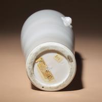 A Chinese Blanc-de-Chine Porcelain Sleeve Vase, Early Qing Dynasty — 清早期 德化白瓷雙獸首筒瓶