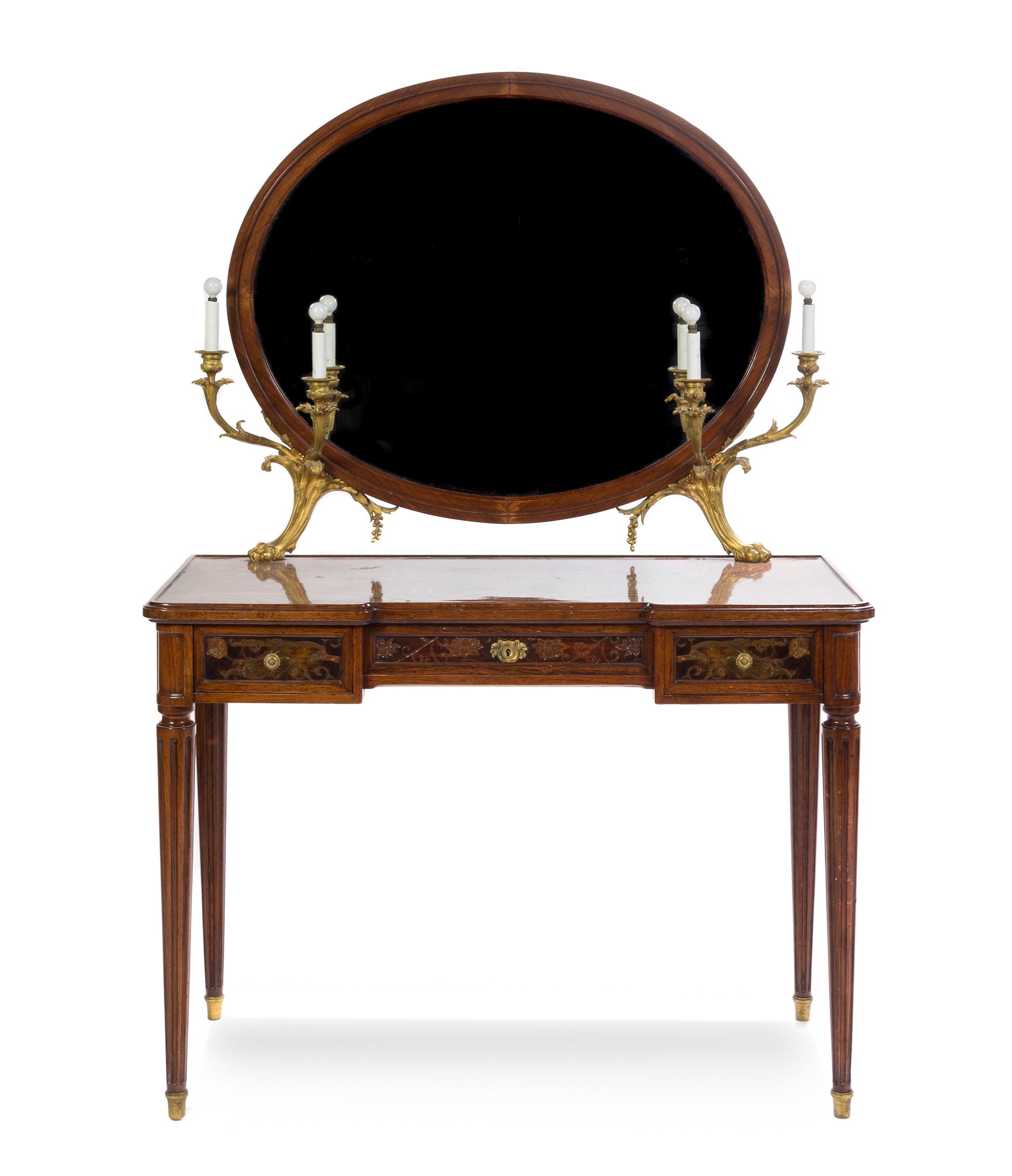 A Louis XVI Style Gilt Bronze Mounted Kingwood Dressing Table Height 60 1/4 x width 41 x depth 20 1/2 inches. — FIRST QUARTER 20TH CENTURY