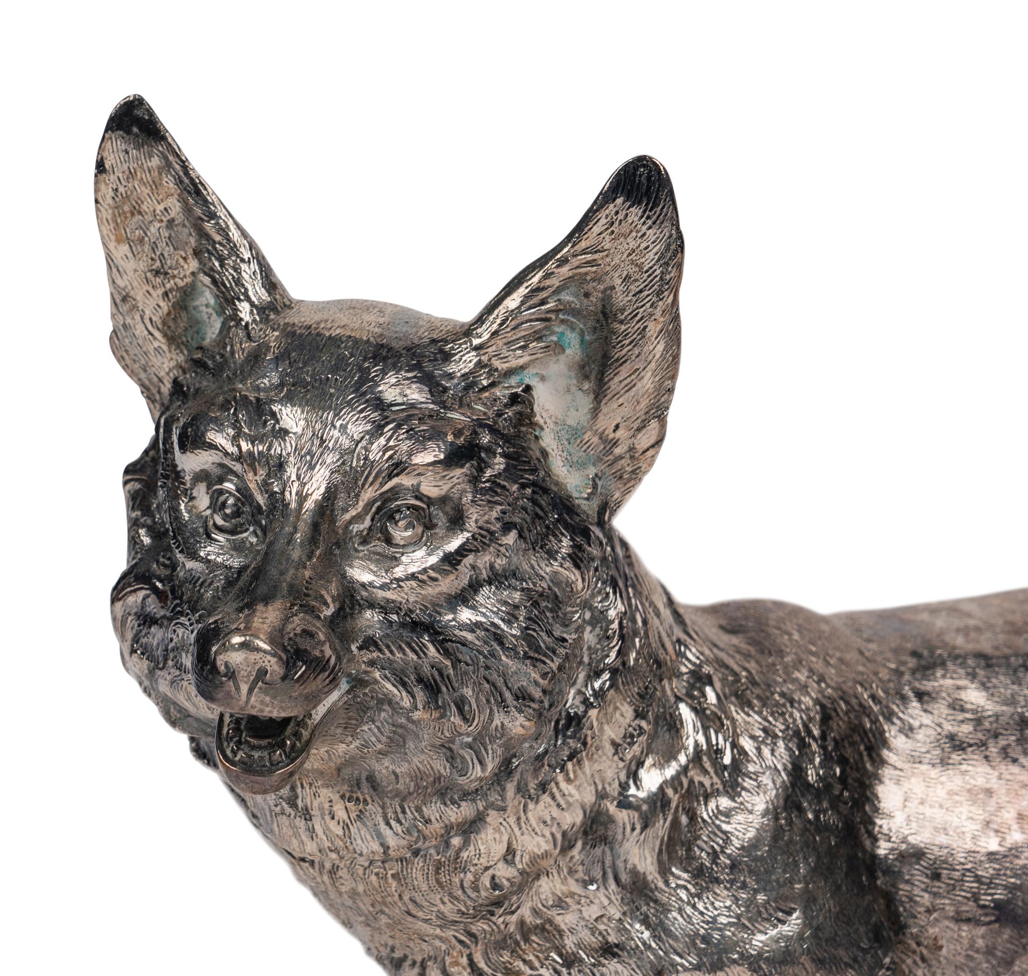 A Pair of Silver Fox-Form Table Ornaments